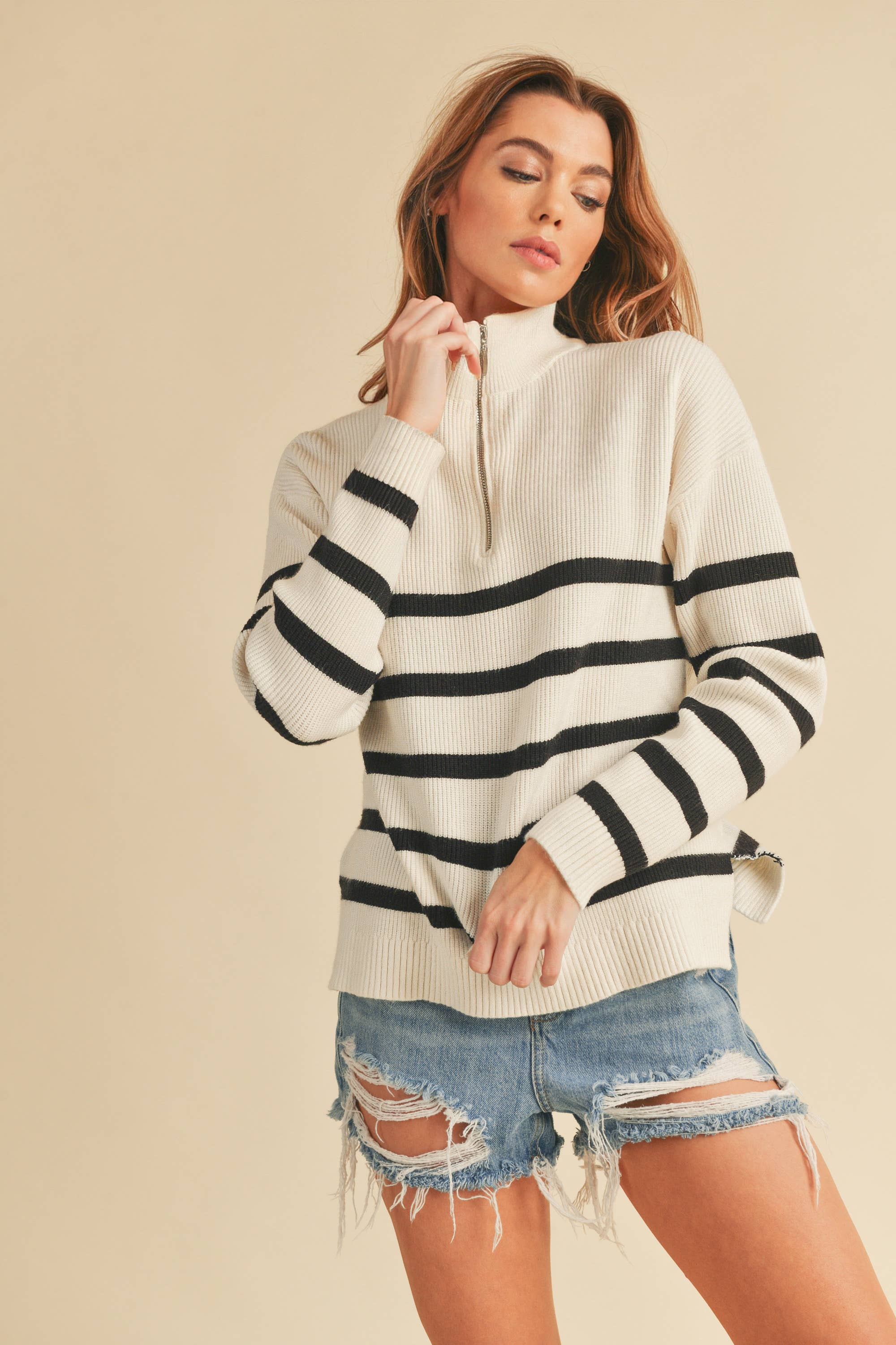 Daffie Striped Quarter Zip Sweater